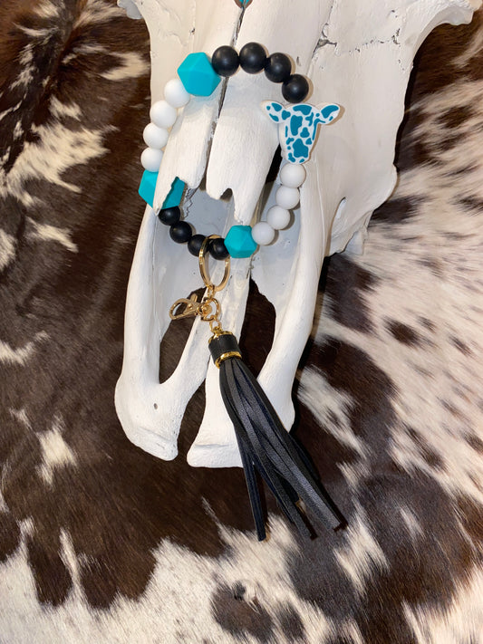 Turquoise and black cow keychain