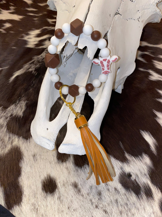 Brown and white cow keychain